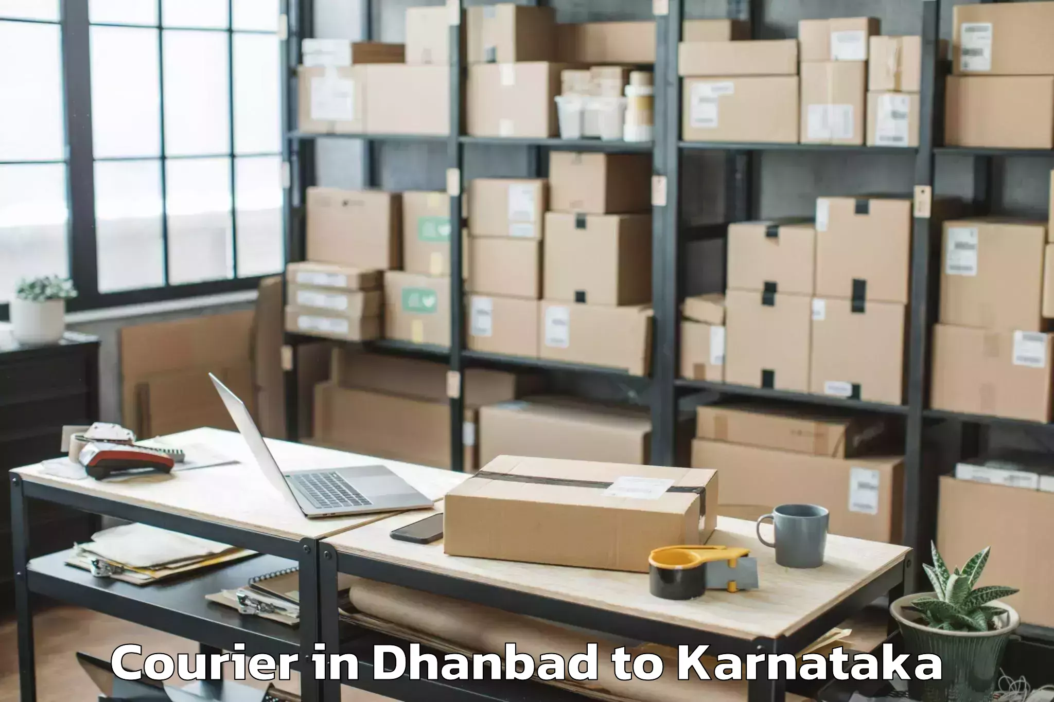 Reliable Dhanbad to Karnataka State Law University Courier